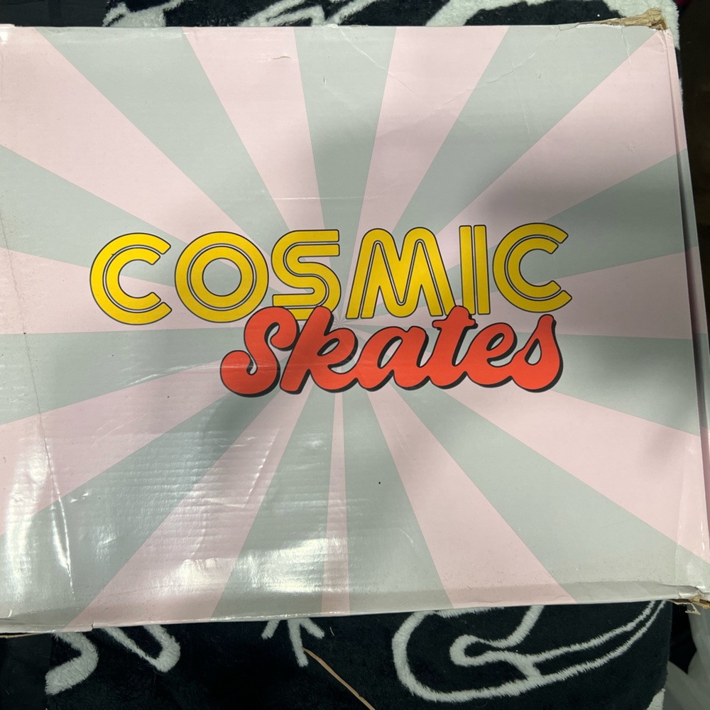 cosmic skates/ dolls kill black roller skates